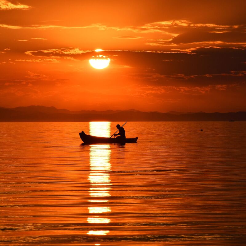 lakemalawi-malawi-finetravel-ostschweiz-reisebuero-traumferien-sonnenuntergang-exklusivereisen-individuell-baden